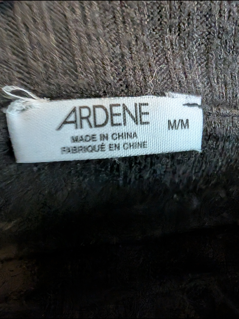 Ardene Black Off-the-Shoulder Ribbed Sweater Flared Scallop Sleeves - Picture 7 of 10